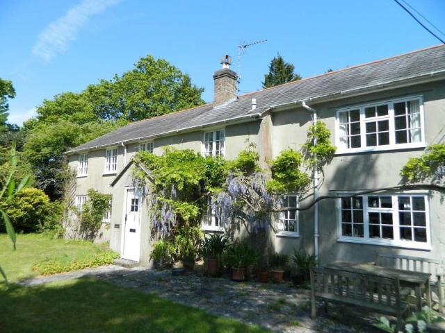 River Cottage a country retreat in wooded gardens