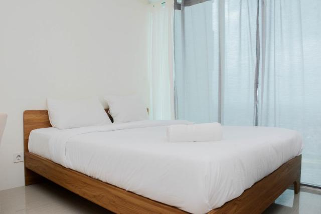 Comfy and Warm Studio Grand Kamala Lagoon Apartment By Travelio