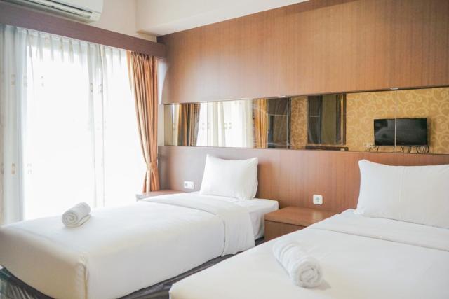 Compact and Cozy Studio Atria Residence Gading Serpong Apartment By Travelio