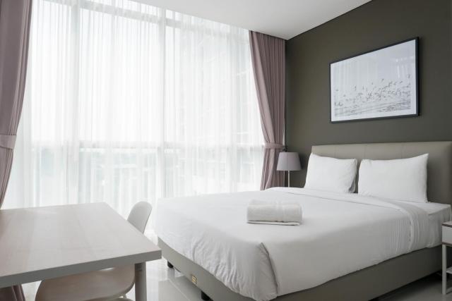 Lavish 1BR at Ciputra International Apartment By Travelio