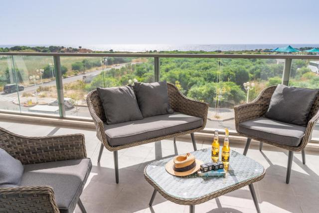 Sunlit Balcony and Coastal Charm by Sea N' Rent