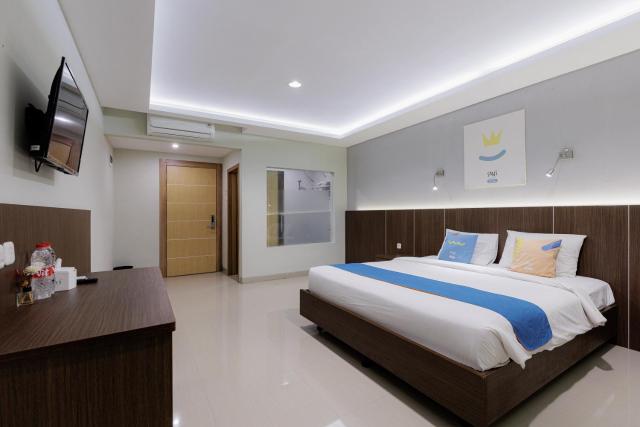 Sans Hotel Rumah Kita Daan Mogot by RedDoorz