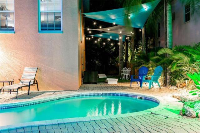 Tropical luxury pool home by the beach with roof top lounge centrally located on Anna Maria Island