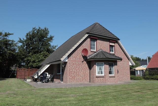 Strandnahes Ferienhaus Fischotter mit Garten