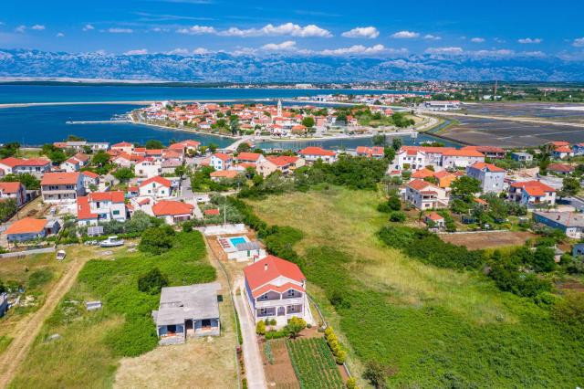 Family friendly apartments with a swimming pool Nin, Zadar - 18821