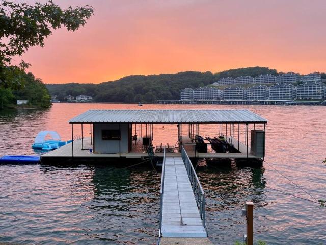 Sunset Harbor Lake of the Ozarks Lake Front House w HUGE dock, boat slips, kayaks, paddle boards, MM35 4bd 3ba