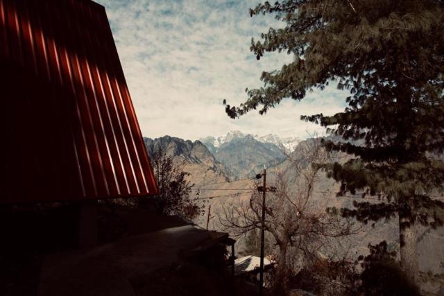 Cottages Amid Mountains