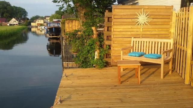 Chalet direkt an der Gracht mit eigenem Bootsanlegesteiger