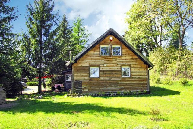 Cottage with large garden near lake