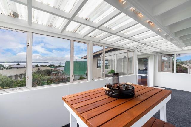 Couches, Bar Table & Kawau View