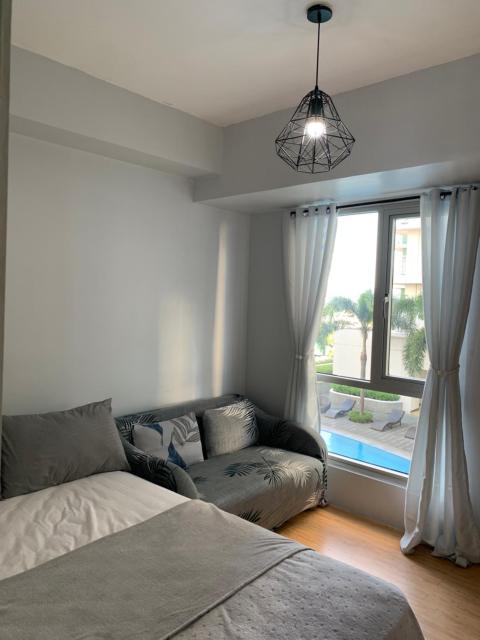 Minimalist 1 Bedroom in Alabang near Molito and ATC with WiFi & Netflix m