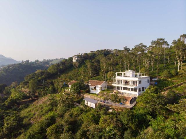 StayVista at Ozone Greens view of the unending Slopes and Valleys