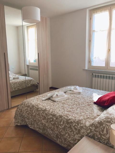 "Coccole nel borgo" 2min to outlet apartment with terrace