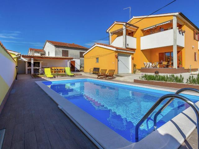 Holiday home with swimming pool