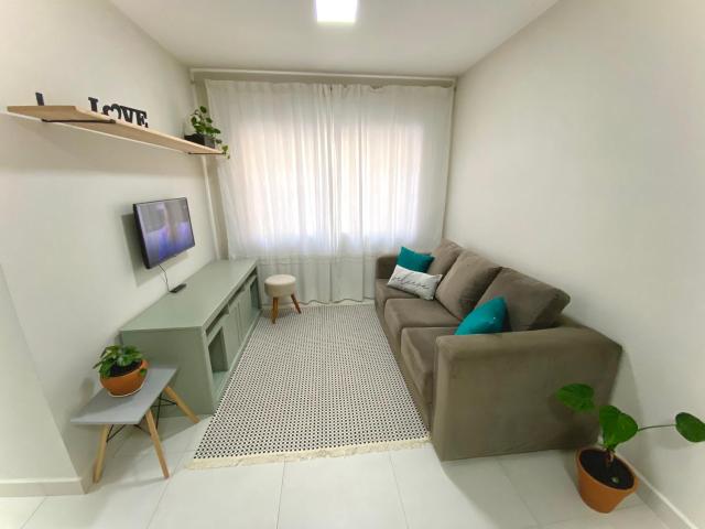 Apartamento no centro, ar-condicionado e garagem