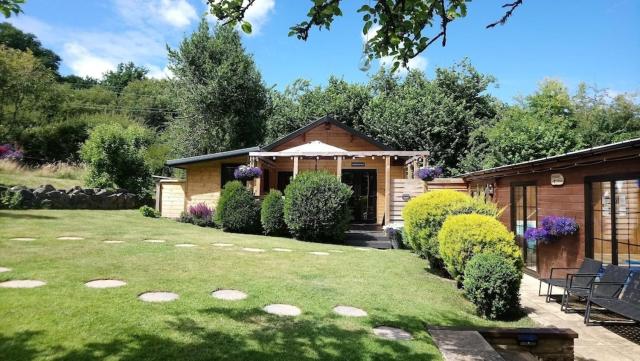 'Monktonmead Lodge' in secluded setting, with private indoor pool.