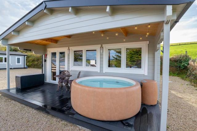 Luxury Log Cabin with Private Hot Tub & Sea Views