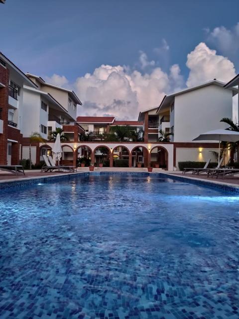 SEVEN SHADES OF CORAL VILLAGE - suites & pool in a residence close to the beach