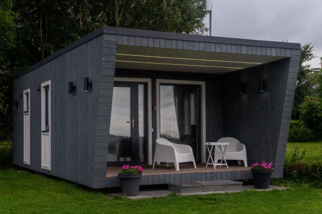 Tiny house aan het water op de appelhof