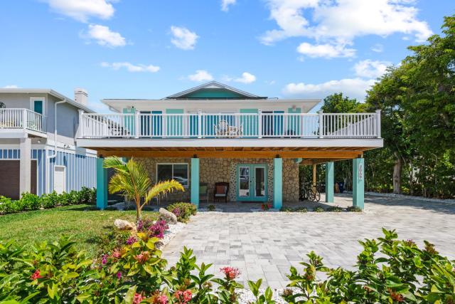 Heated Pool Home steps to the beach