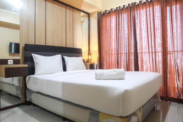 Spacious 1BR at The Oasis Cikarang Apartment By Travelio