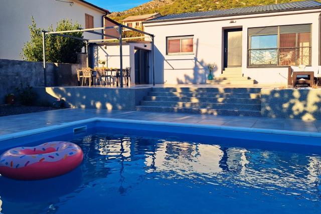 Holiday house with a swimming pool Senj - 21661