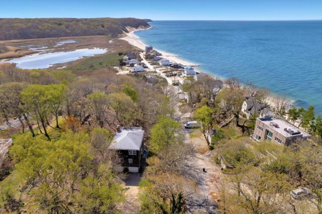 Escape to Paradise: Steps to Beach & Spacious Deck