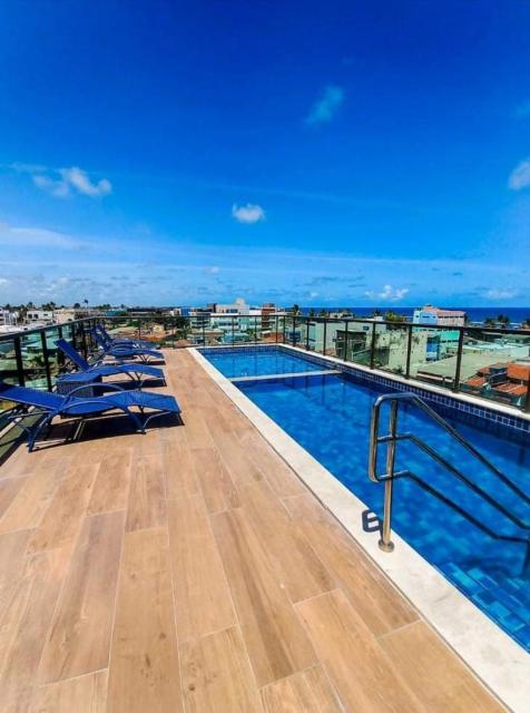 Flat com Rooftop à 100metros das Piscinas Naturais