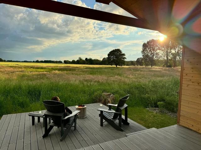 Tinyhouse mit Wiesenblick, Holzdeck und Kamin