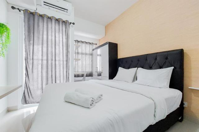 Minimalist and Homey Studio Serpong Garden Apartment By Travelio