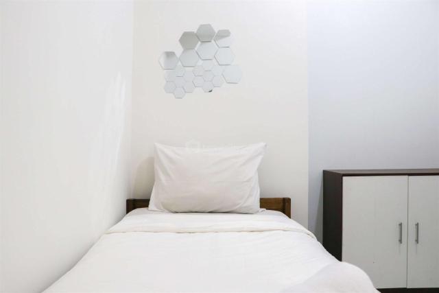 Cozy 2BR at Mekarwangi Square Cibaduyut Apartment By Travelio