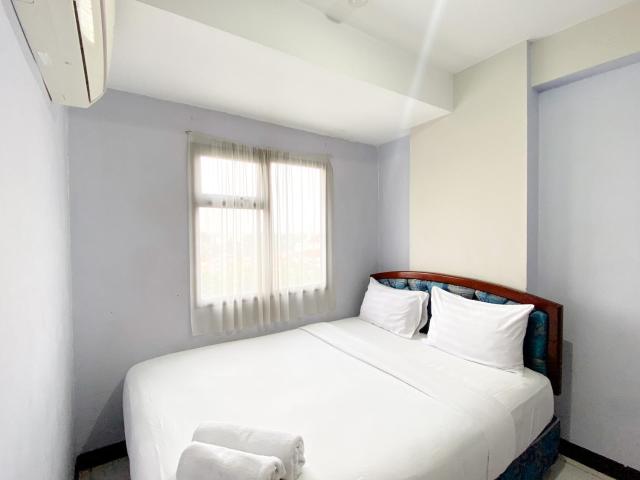 Homey and Cozy Living 2BR Lagoon Bekasi Town Square Apartment By Travelio