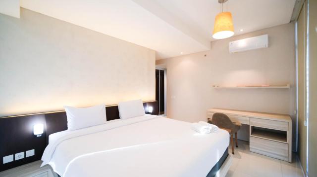 Exclusive 2BR Connected to Mall Apartment at Aryaduta Residence Surabaya By Travelio