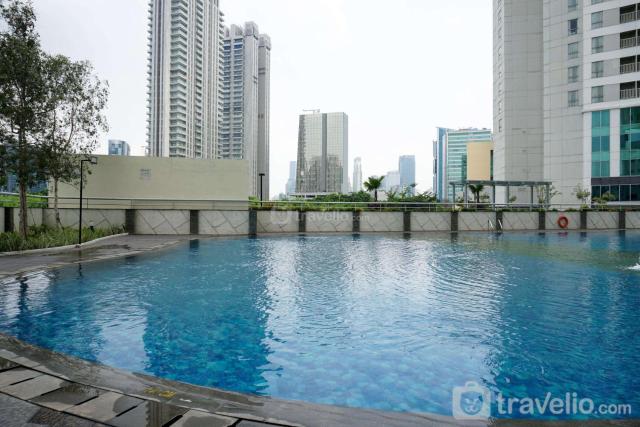 Comfy and Minimalist 1BR at The Wave Kuningan Apartment By Travelio