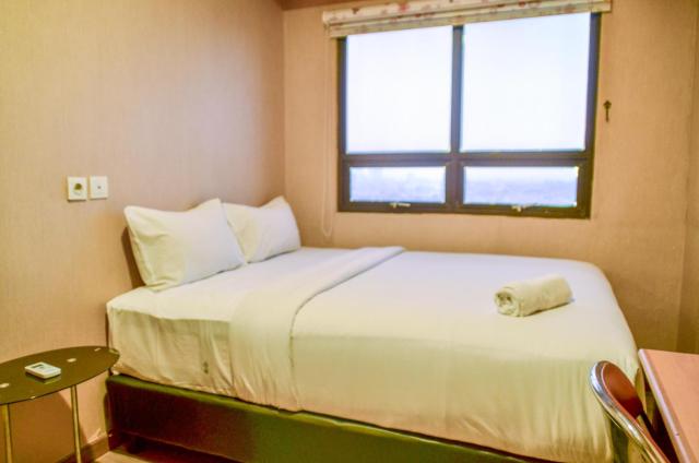 Nice and Cozy 2BR Apartment at Atria Residence Gading Serpong By Travelio