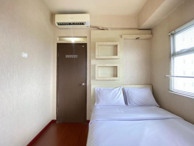 Cozy and Spacious 2BR at Suites @Metro Apartment By Travelio