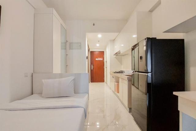 Homey Studio Room at Sky House BSD Apartment By Travelio