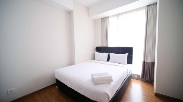 Homey 3BR with Private Lift at Grand Sungkono Lagoon Apartment By Travelio