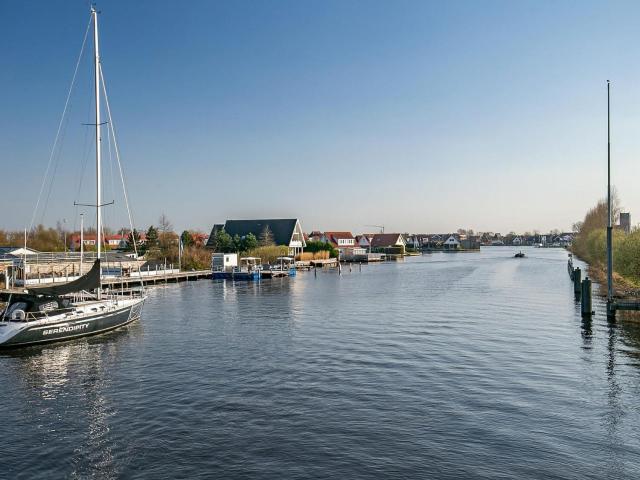 Holiday home with garden near watersports