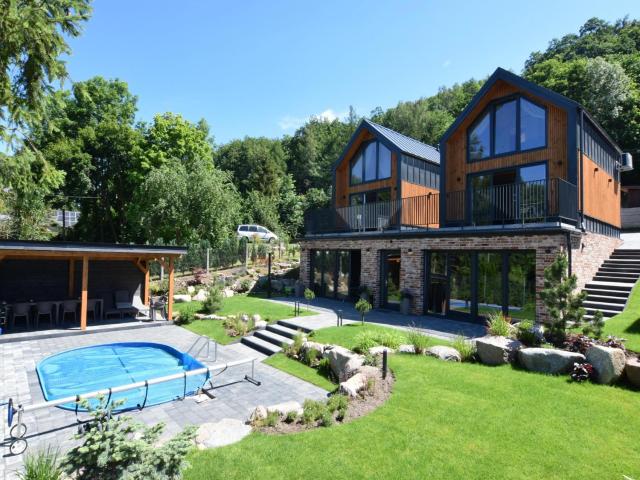 Holiday home with pool and sauna