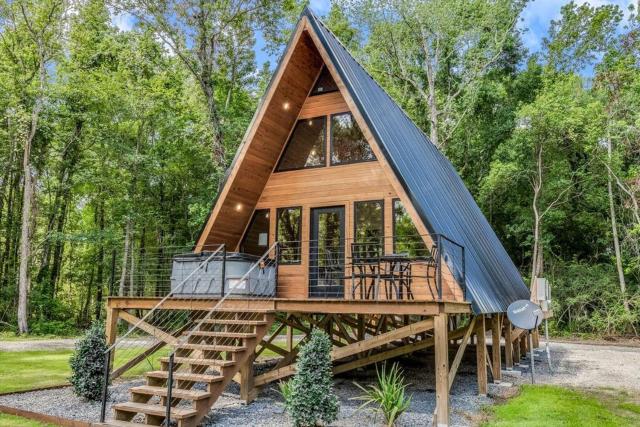 Modern A-Frame Cabin by Rip Van Winkle with Hot Tub