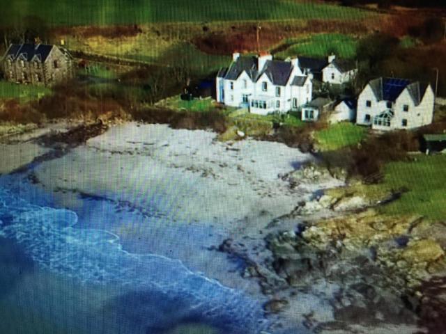 Unique house in an idyllic situation on a beach