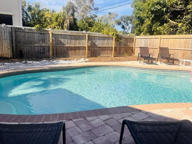 Large Backyard with heated pool/ Near Beach