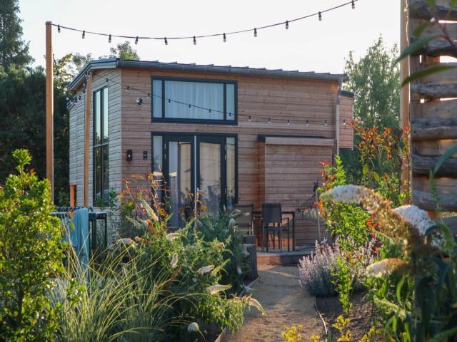 Nice tiny house with pellet stove in holiday park