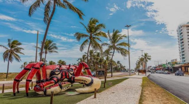 Quase pé na areia 60m da praia