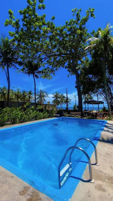 Frente ao Mar - Suites com Piscina Aquecida, SPA Privativo, Vista ao Mar ou Montanha, com Estacionamento- Raizes do Mar ECO Hotel