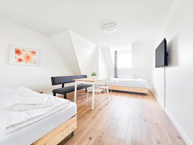 RAJ Living - 2 Zimmer Dachgeschosswohnung - 25 Min zur Messe DUS