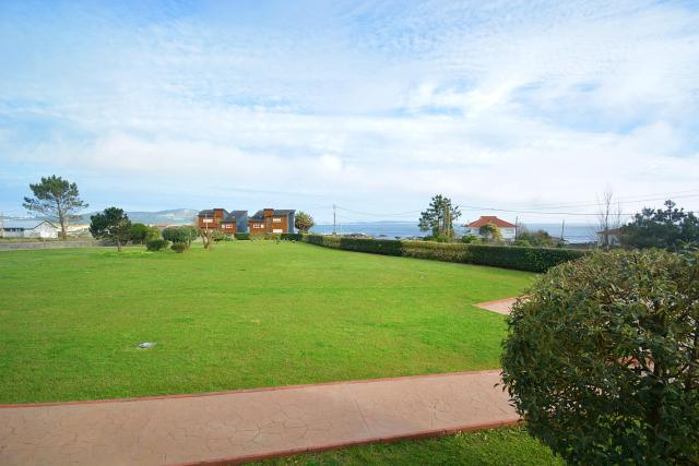 Apartamento con jardín en Playa de Corrubedo