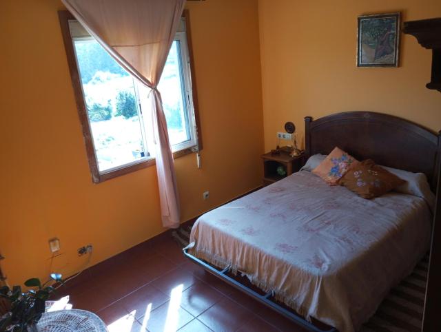 Habitación cama matrimonial en A Armenteira