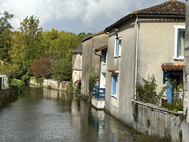 Right on the river- 4 bedroom house centre of town